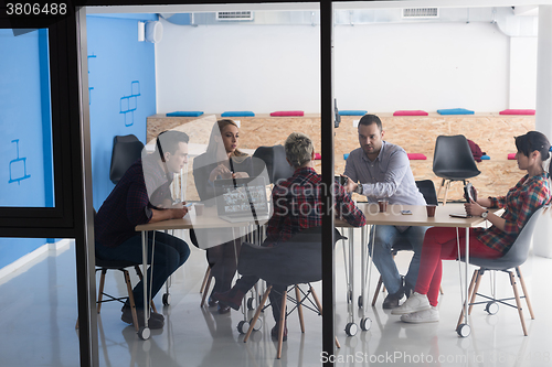 Image of startup business team on meeting at modern office