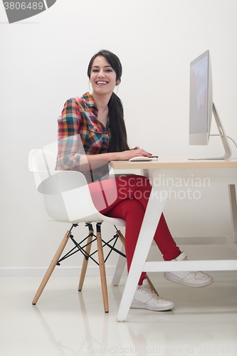 Image of startup business, woman  working on desktop computer