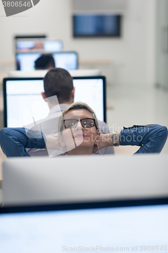 Image of startup business, woman  working on desktop computer