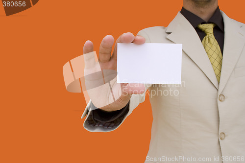 Image of Businessman showing his card