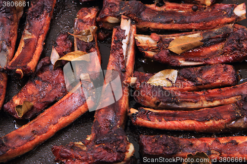 Image of smoked pig ribs background