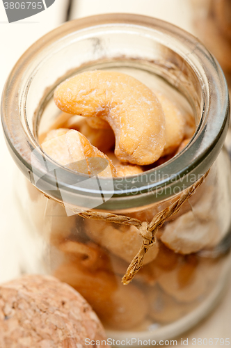 Image of cashew nuts on a glass jar 