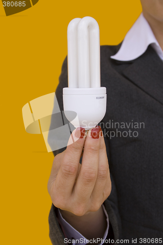 Image of businesswoman holding a lamp 3