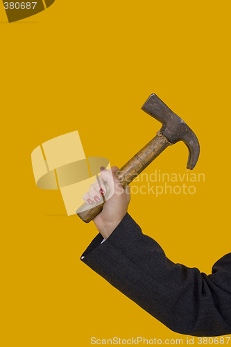 Image of businesswoman with a hammer