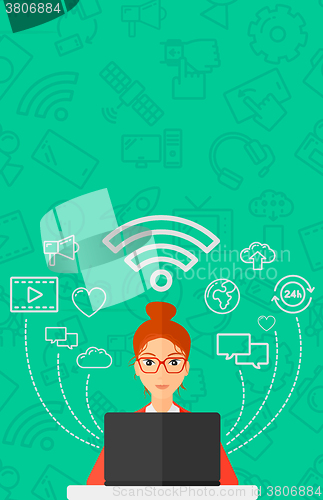Image of Woman working on laptop.