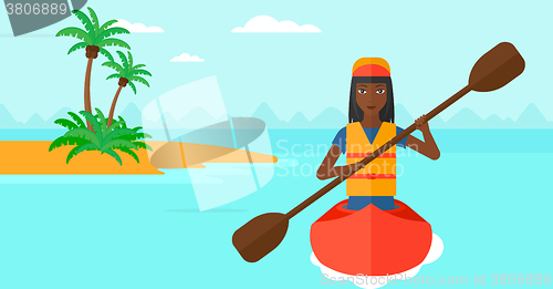 Image of Woman riding in canoe.