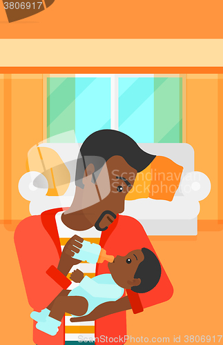 Image of Man feeding baby.