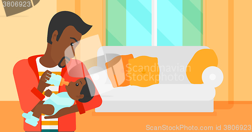 Image of Man feeding baby.