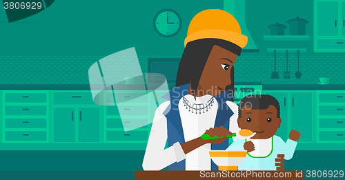 Image of Woman feeding baby.