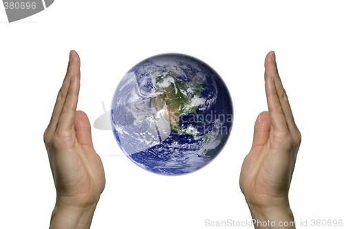 Image of Earth between two hands 1