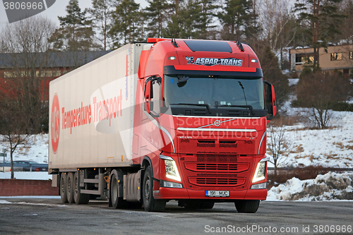 Image of Red Volvo FH Semi At Truck Stop