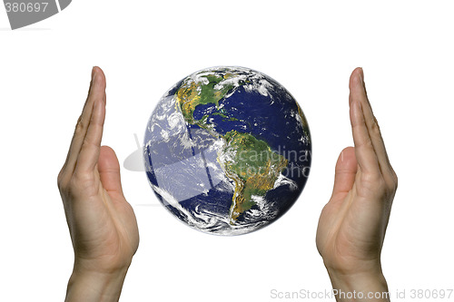 Image of Earth between two hands 2