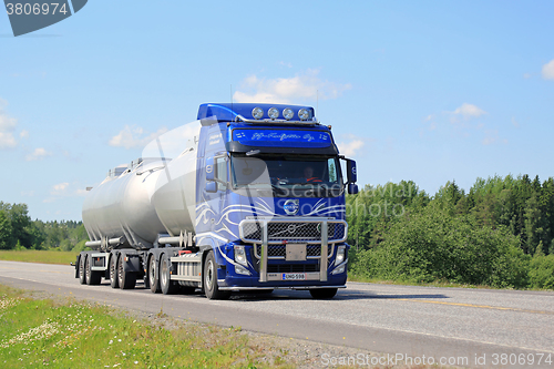 Image of Blue Volvo FH Tank Truck on Summer Highway