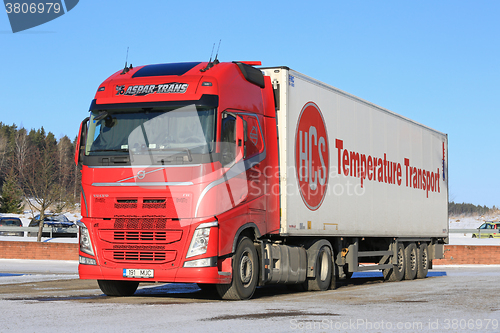 Image of Red Volvo FH Semi and Blue Sky