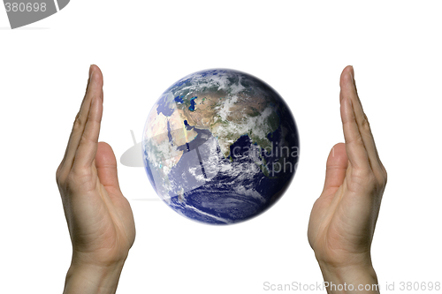 Image of Earth between two hands 3