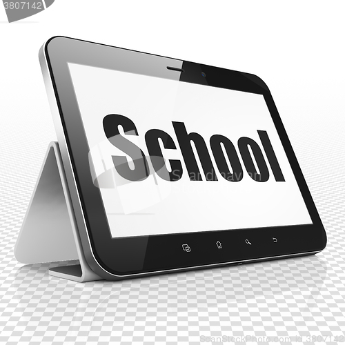 Image of Education concept: Tablet Computer with School on display