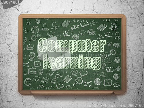 Image of Education concept: Computer Learning on School Board background