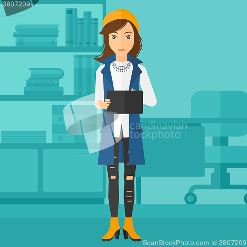 Image of Woman using tablet computer.