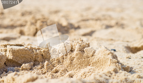 Image of wet sand pile