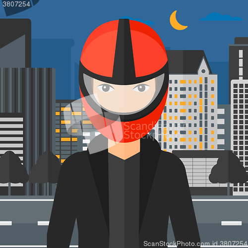 Image of Woman in biker helmet.