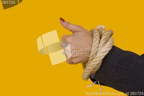 Image of Captive woman saying "Ok"
