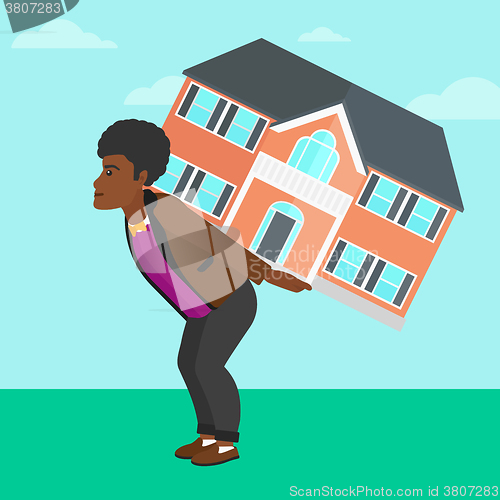 Image of Man carrying house.