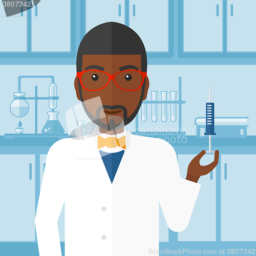 Image of Doctor with syringe in laboratory.