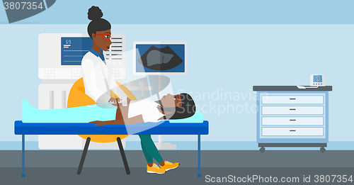 Image of Patient under ultrasound examination.