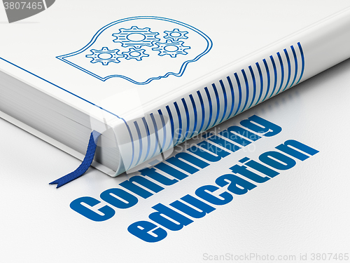 Image of Education concept: book Head With Gears, Continuing Education on white background