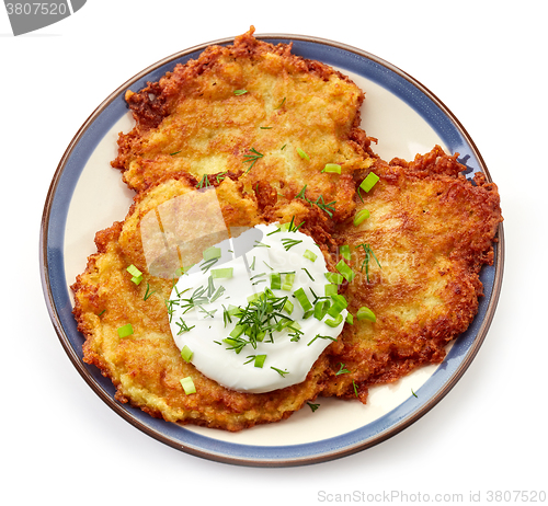 Image of potato pancakes on white background