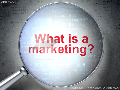 Image of Marketing concept: What is a Marketing? with optical glass