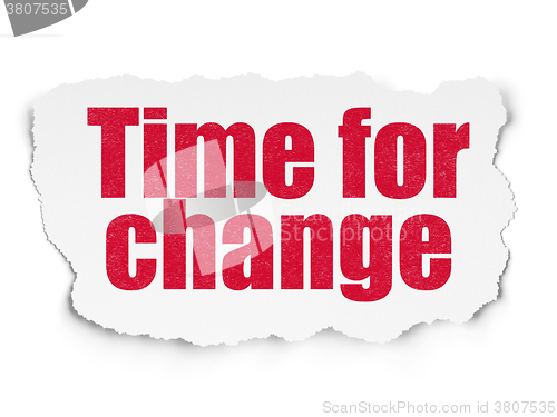 Image of Time concept: Time for Change on Torn Paper background