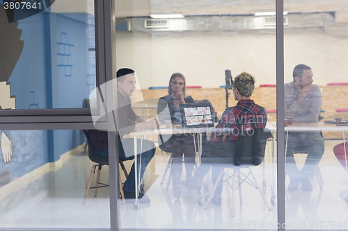 Image of startup business team on meeting at modern office