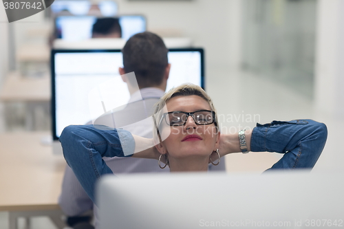 Image of startup business, woman  working on desktop computer