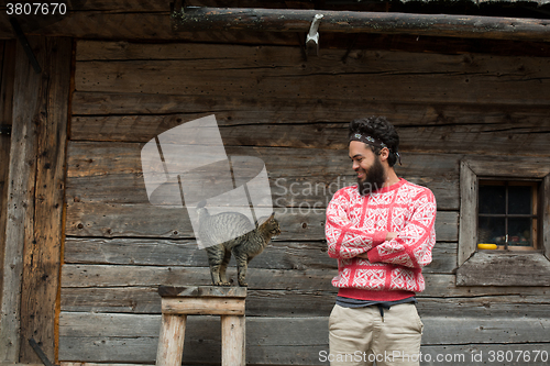 Image of portrait of man and cat