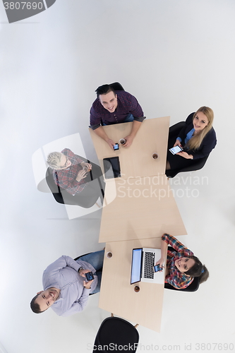 Image of aerial view of business people group on meeting