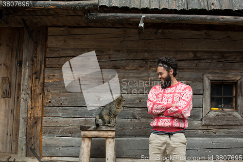 Image of portrait of man and cat