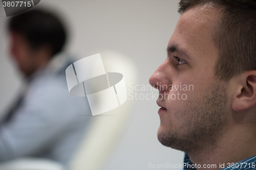 Image of photo editor at his desk