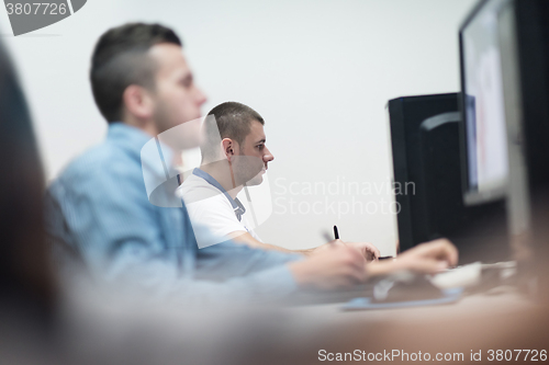 Image of photo editors on work