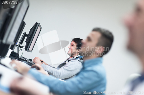 Image of photo editors on work