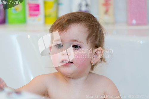 Image of little girl taking spa bath