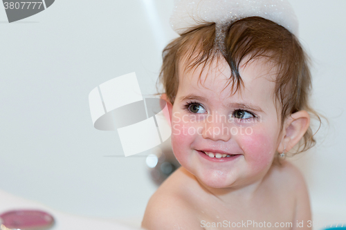 Image of little girl taking spa bath