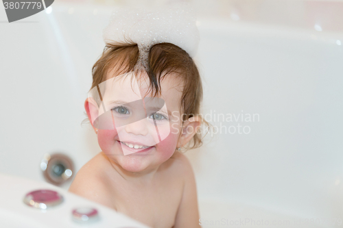 Image of little girl taking spa bath