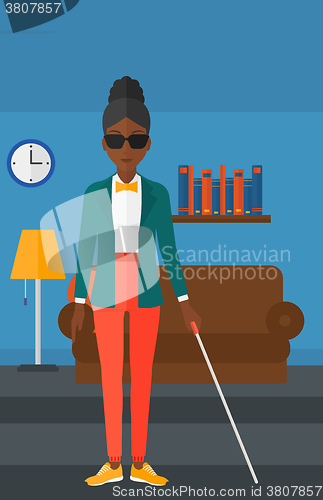 Image of Blind woman with stick.