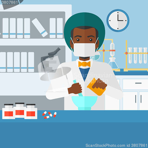 Image of Pharmacist preparing medicine.