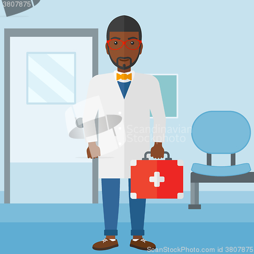 Image of Doctor with first aid box.