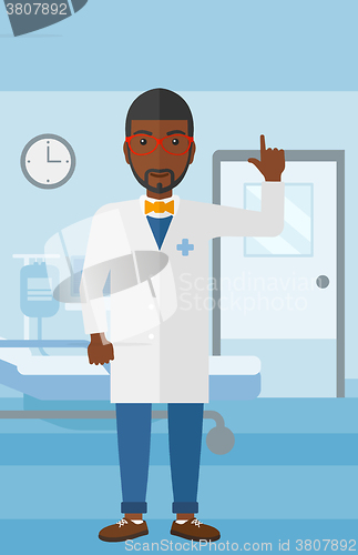 Image of Doctor showing finger up.