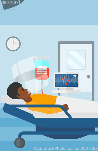 Image of Patient lying in hospital bed.