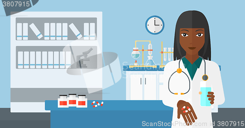 Image of Pharmacist giving pills.