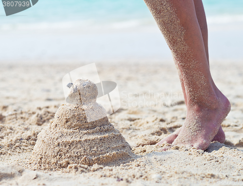 Image of sandy man and legs